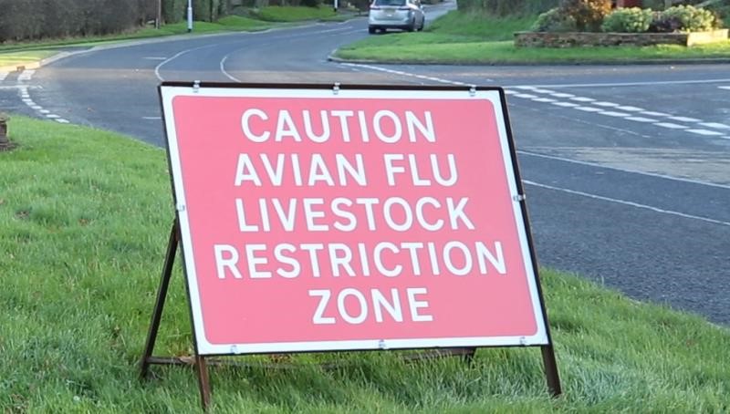 Avian flu restrictriction zone sign by the side of a road