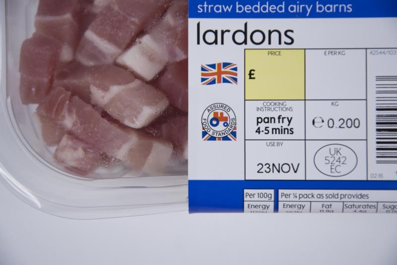 A photo of bacon lardons with a British logo on the labelling.