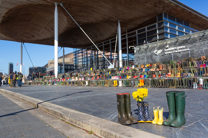 Wellies on the steps of the Senedd
