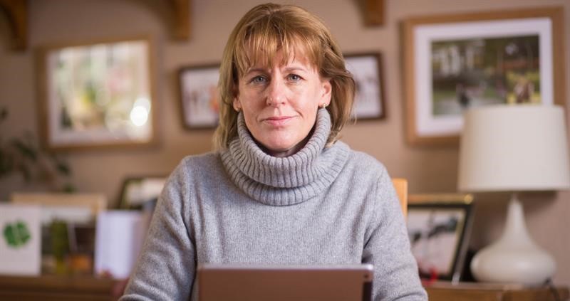 NFU President Minette Batters looking into the camera with her laptop in front