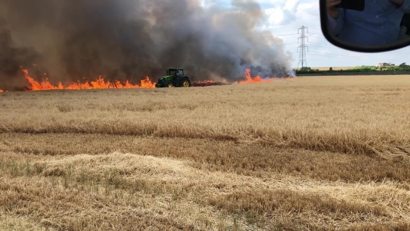 A crop field on fire