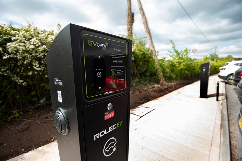 A picture of an electric charger in place at a farm