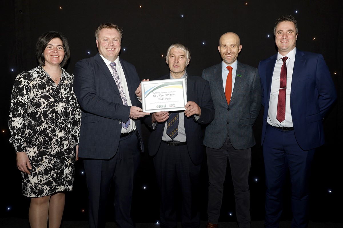 Picture caption: Pictured (L-R) are NFU Cymru President Abi Reader; NFU Director General Terry Jones; NFU Cymru Meurig Raymond Award-winner Hedd Pugh; NFU Cymru Head of Operations Iestyn Pritchard; and NFU Cymru Director John Mercer 
