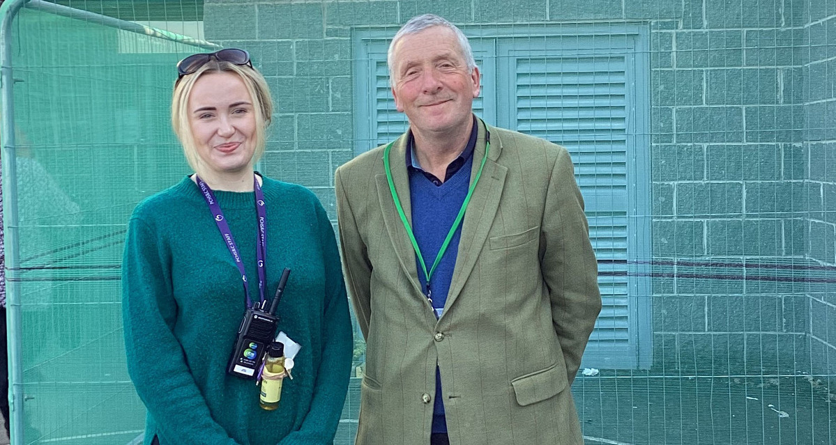 A photo of John Alpe stood outside Pendle School