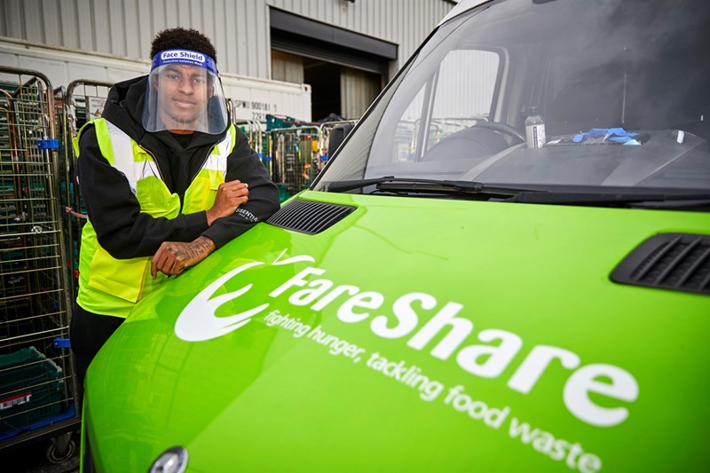 Marcus Rashford MBE English professional footballer who plays as a forward for Premier League club Manchester United and the England national team visiting FareShare Greater Manchester at New Smithfield Market.   Pictured loading a car_79423