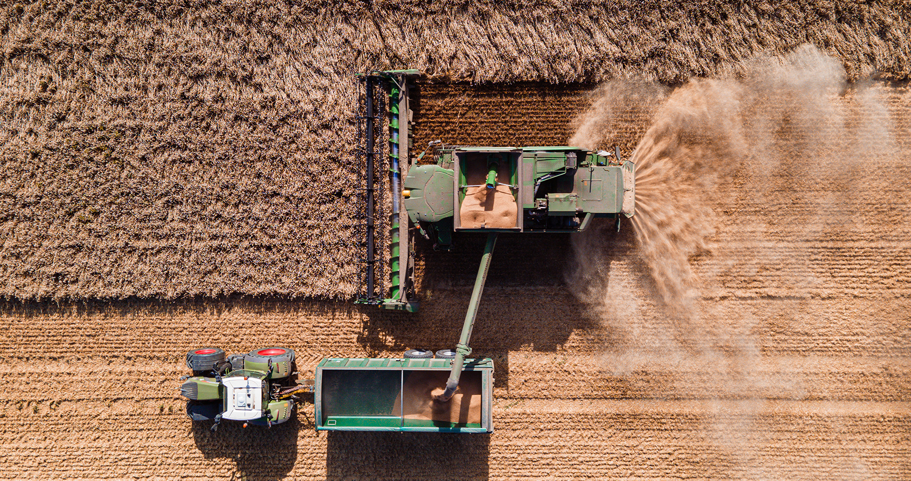 Aerial view of tractors during harvest
