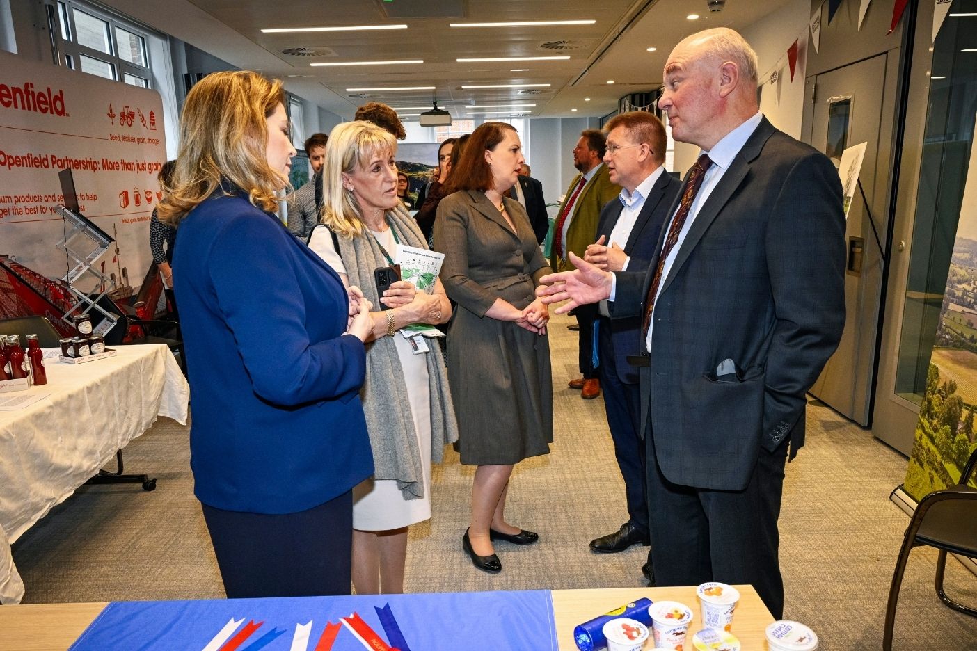 A picture of NFU President Minette Batters speaking with Victoria Prentis and Penny Mourdant at the NFU export stategy launch event