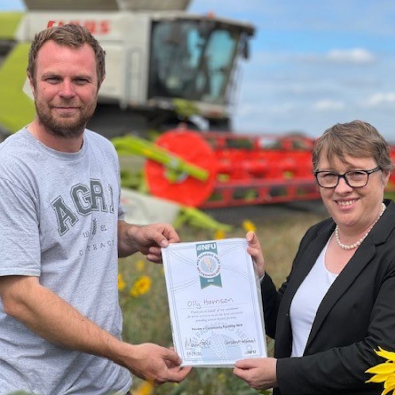 NFU Community Farming Heroes nominee Olly Harrison with Maria Eagle MP