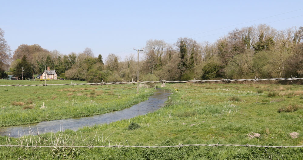 River running though farmland