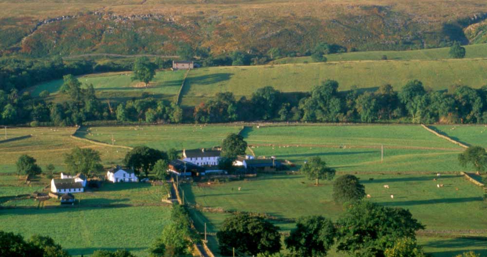 A farm set in open countryside, seen from above