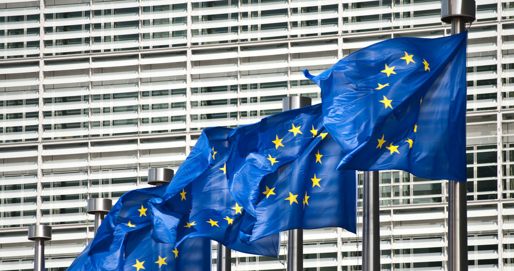 Flags of European Union in front of European Commission in Brussels