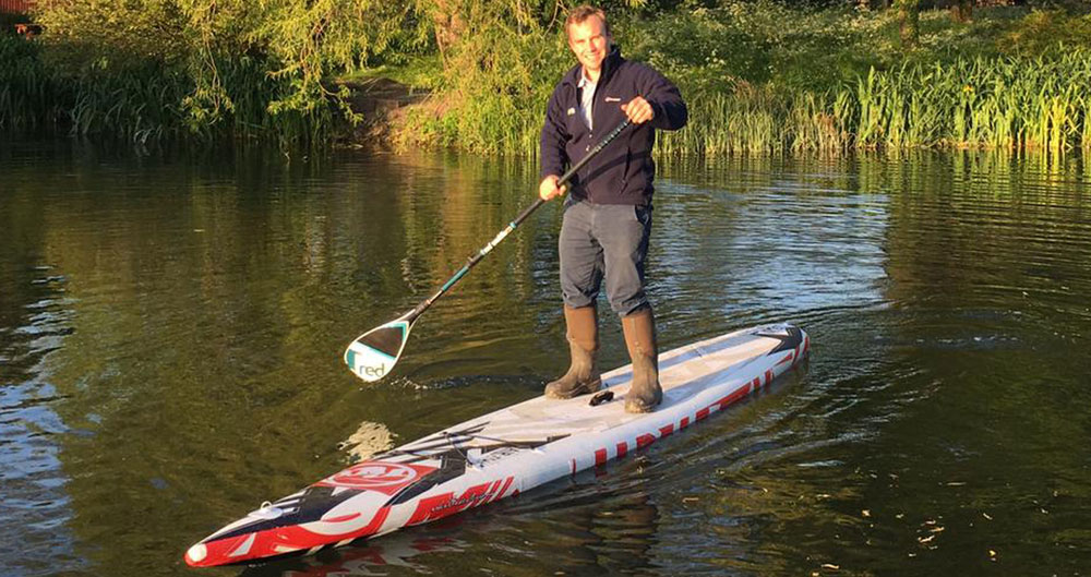 County Adviser Oliver Rubinstein takes to the water