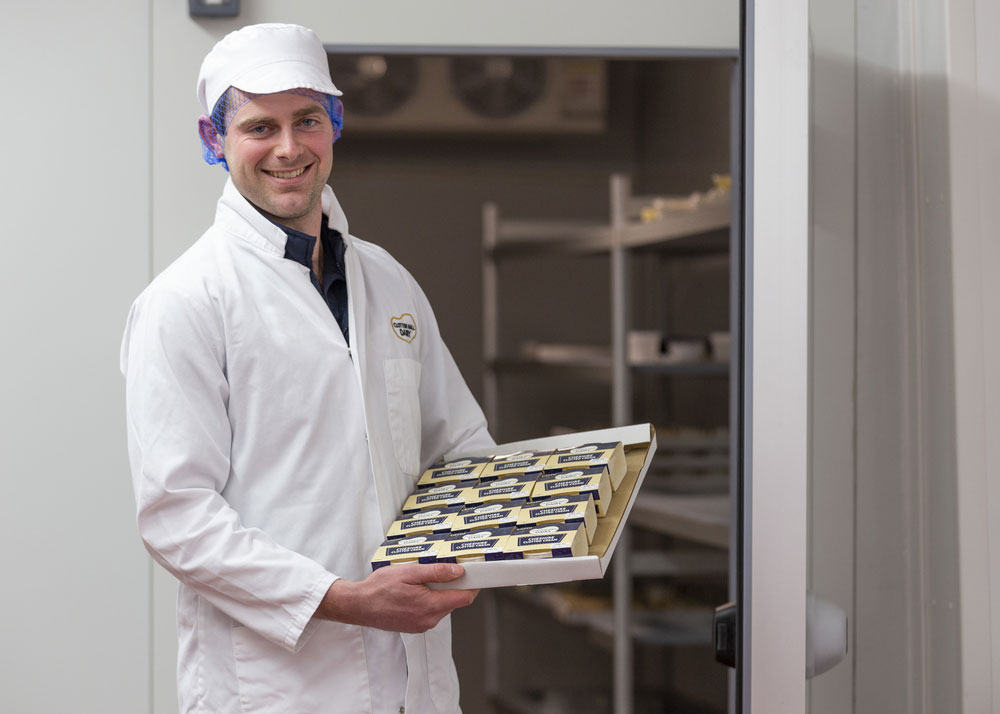 Henry Cooke with Clotton Hall Dairy clotted cream