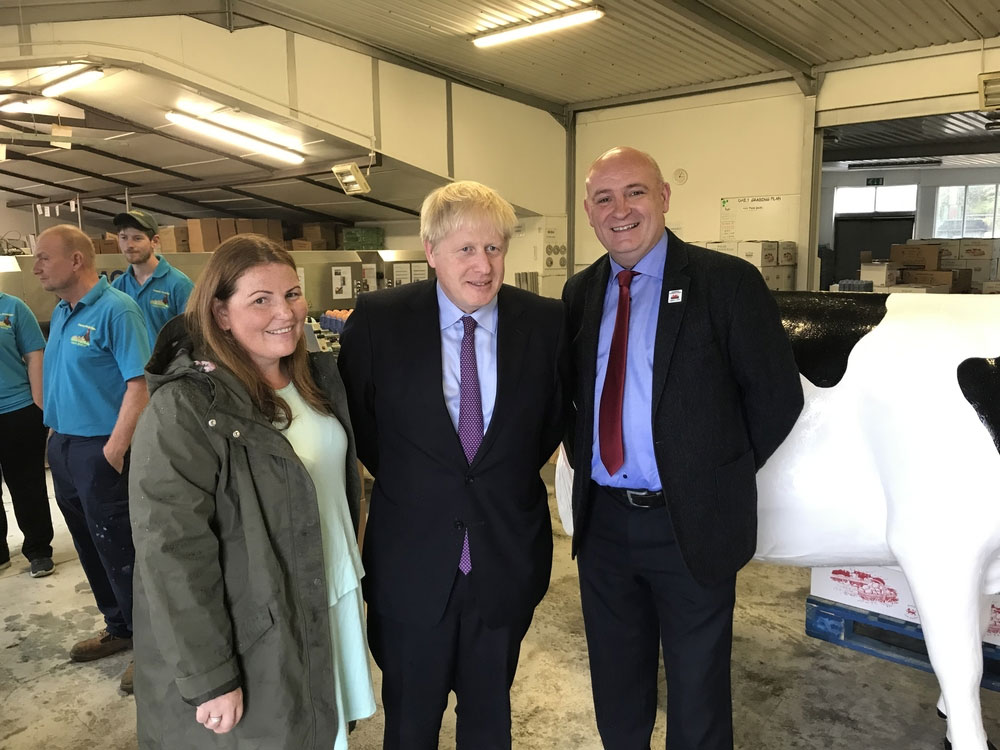 A photograph of Prime Minister Boris Johnson with Victoria Shervington-Jones at her family-owned egg business on the Gwent Levels, west of Newport, south Wales