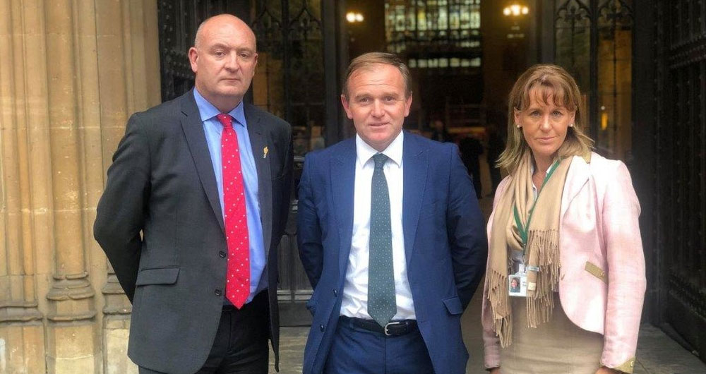 A photo of NFU Cymru President John Davies, Farming Minister George Eustice, and NFU President Minette Batters