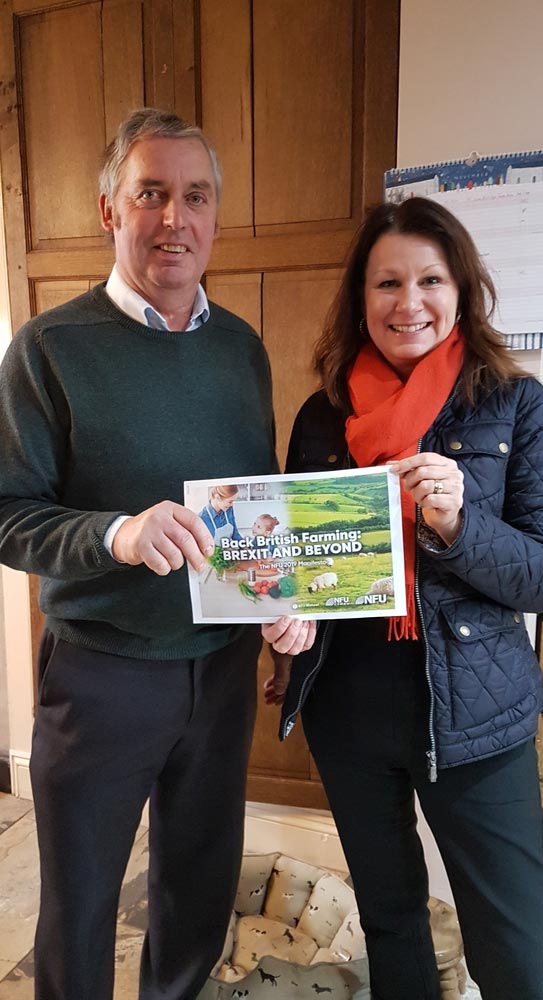 Cumbria County Chairman David Raine presents Shadow Defra Secretary Sue Hayman with the NFU's Brexit & Beyond Manifesto ahead of the 2019 General Election